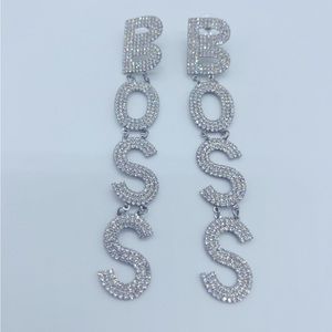 Rhinestone BOSS earrings.
